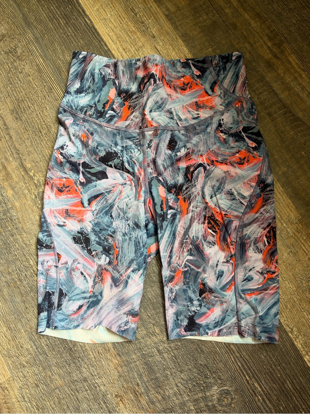Lulu lemon biker shorts. Blue and coral print. Size 4